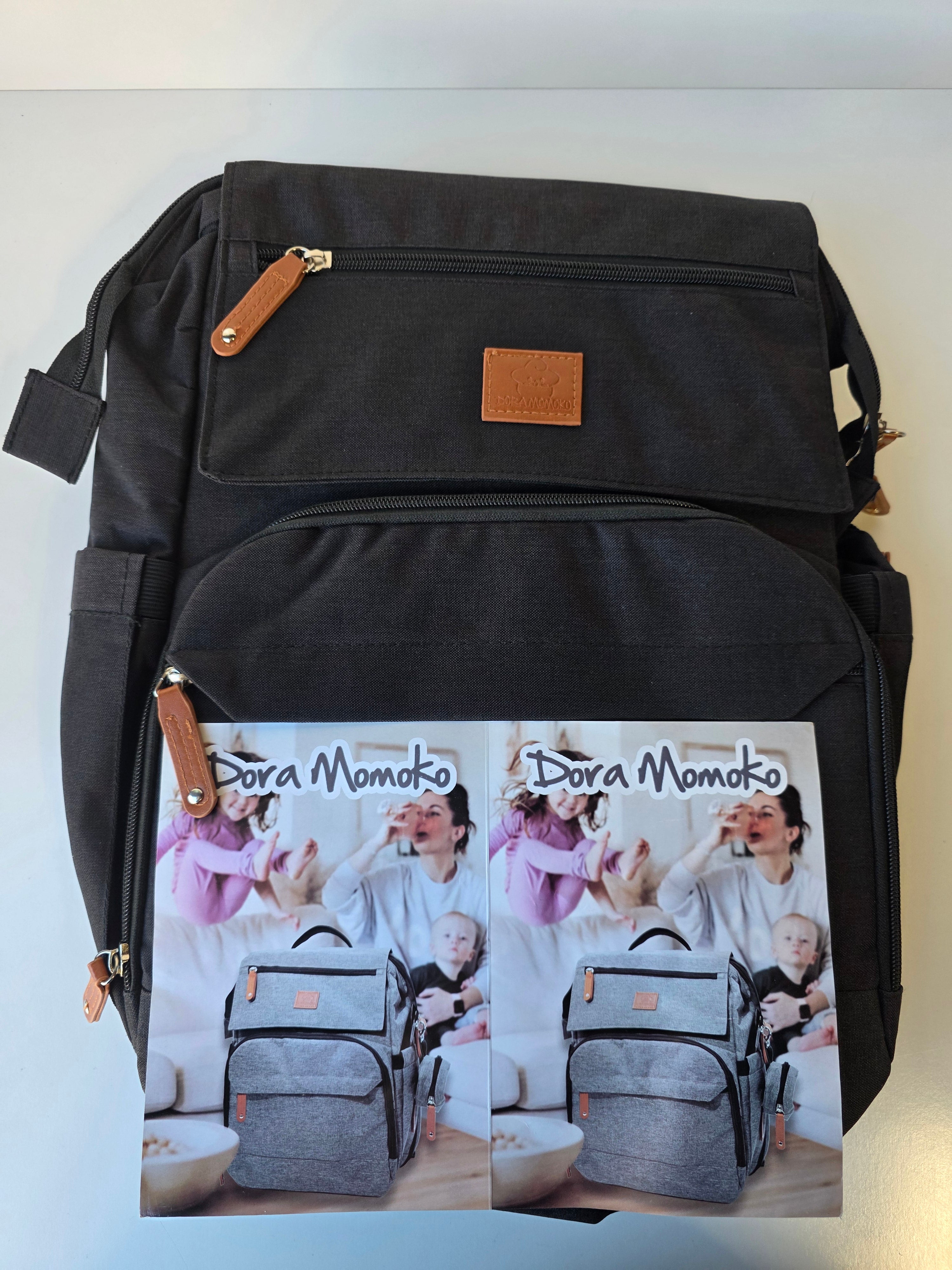 Dora Momoko Multifunction Baby Diaper Backpack with Foldable Bassinet and Stroller Straps