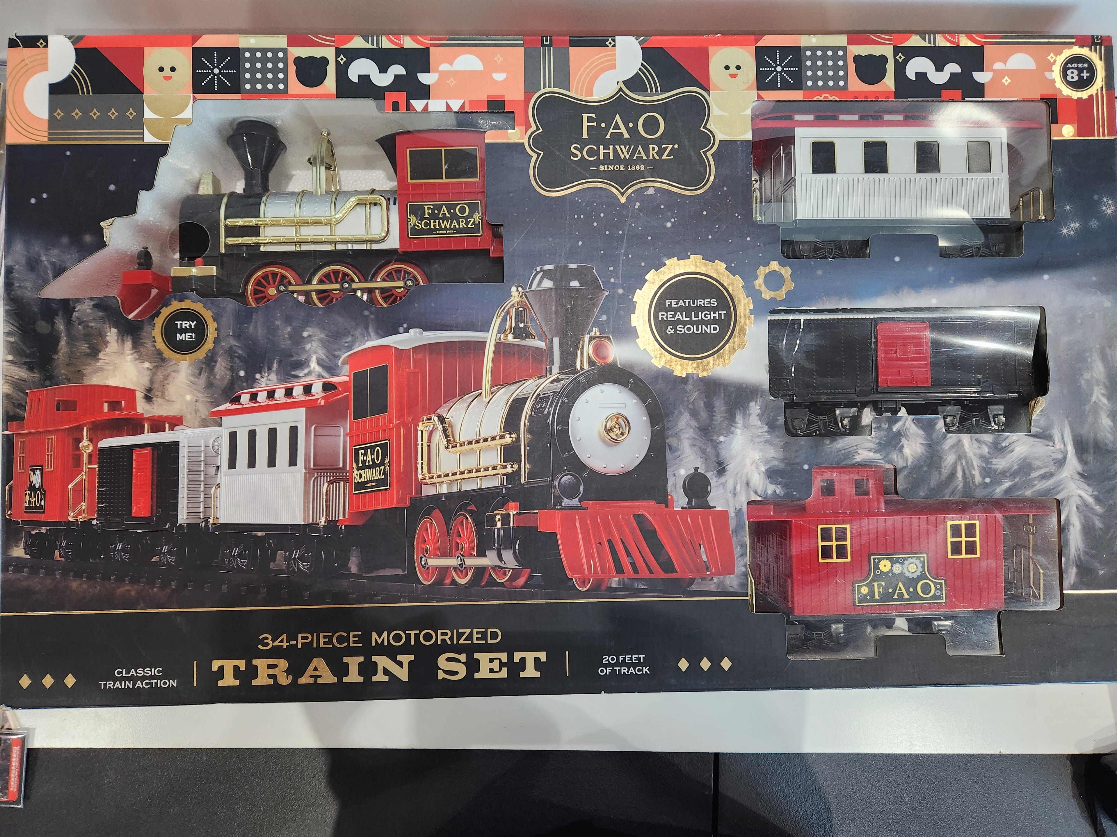 FAO Schwarz 34 Piece Motorized Christmas Train Set Light Sound 20Ft Track