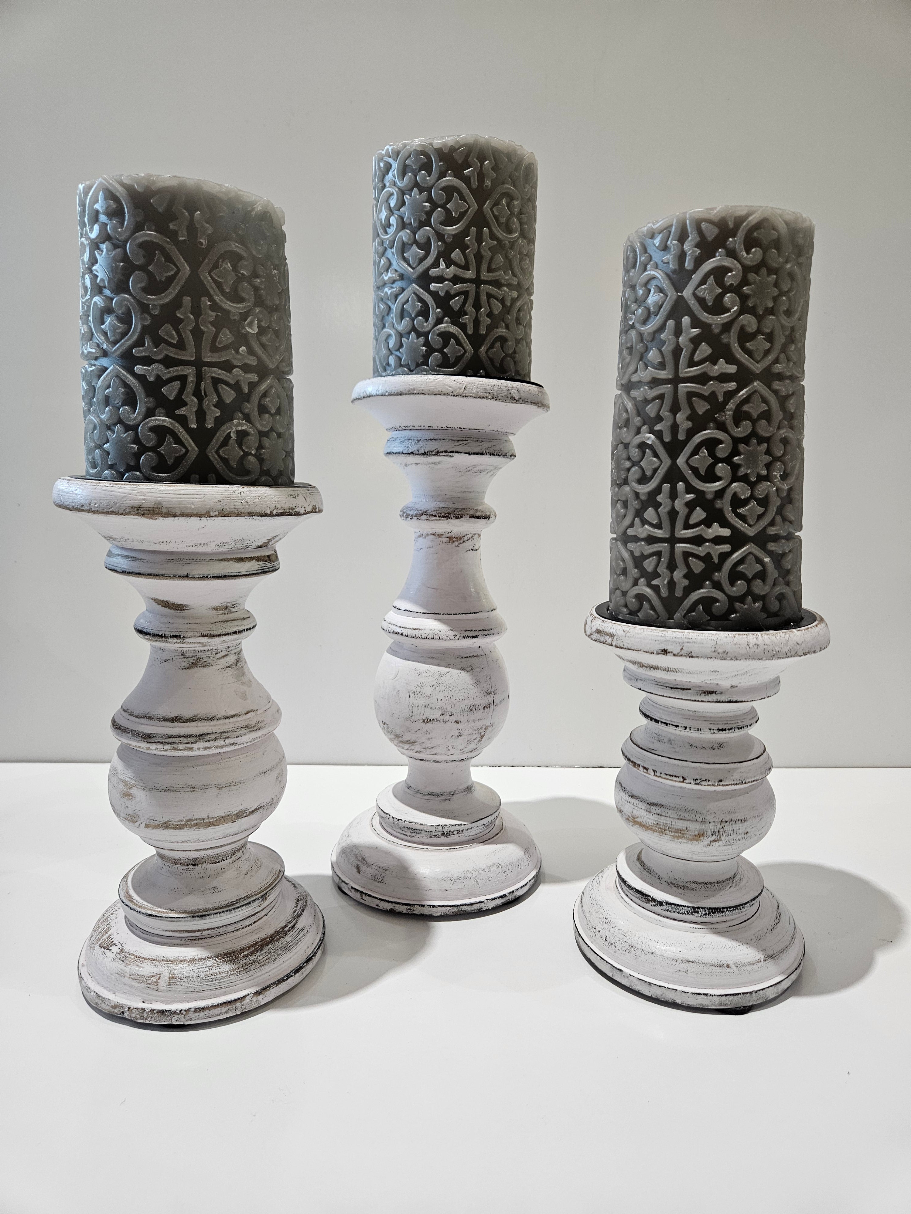 Set Of 3 Distressed White Wooden Pillar Candle Holders With Gray Embossed Candles