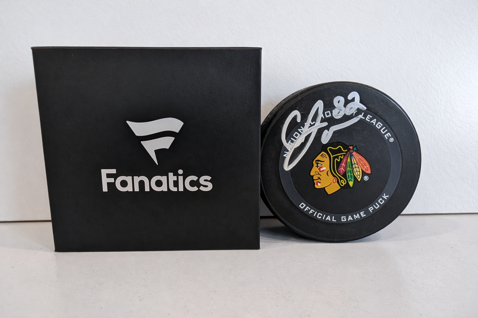 Caleb Jones Signed Autographed Chicago Blackhawks Logo Hockey Puck Fanatics