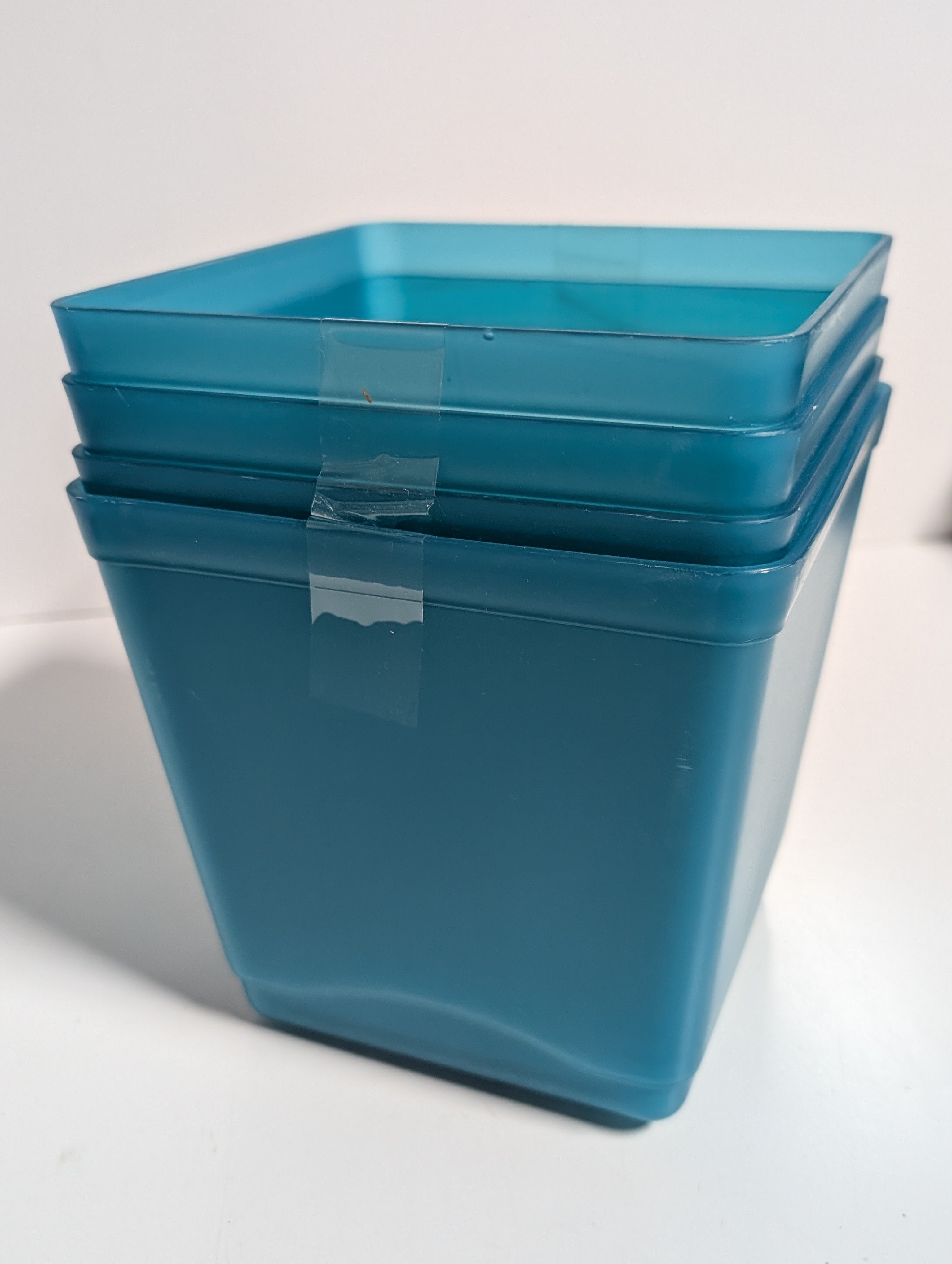 Teal Plastic Cube Storage Bins Four Count Stackable Household Organizing Containers