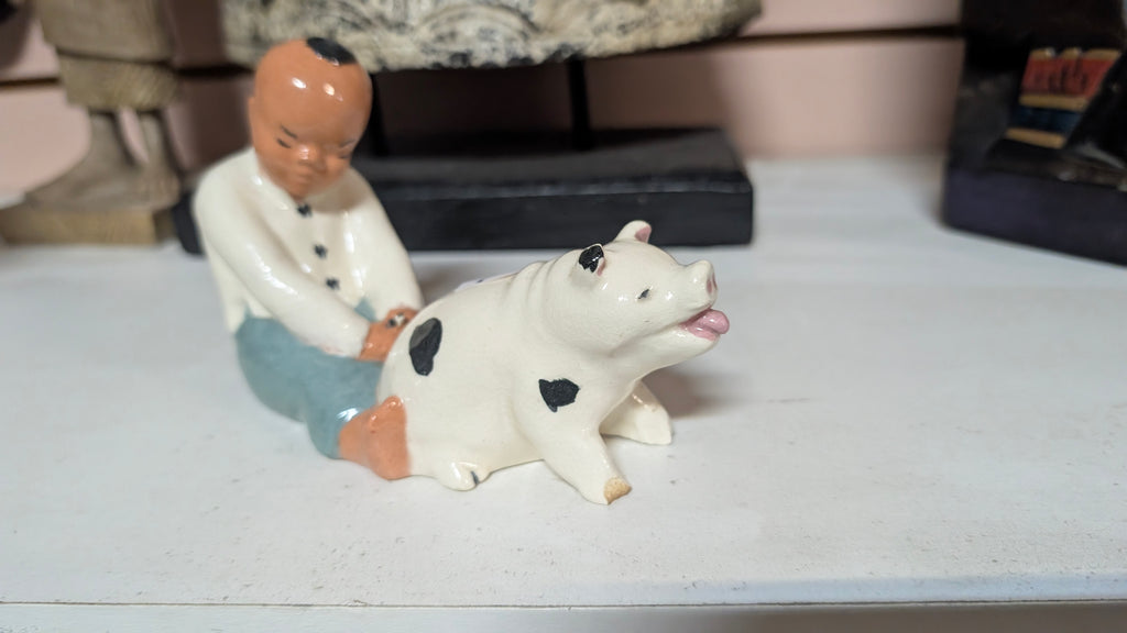 Vintage Hand Painted Ceramic Figurine Child Riding Pig Folk Art Collectible