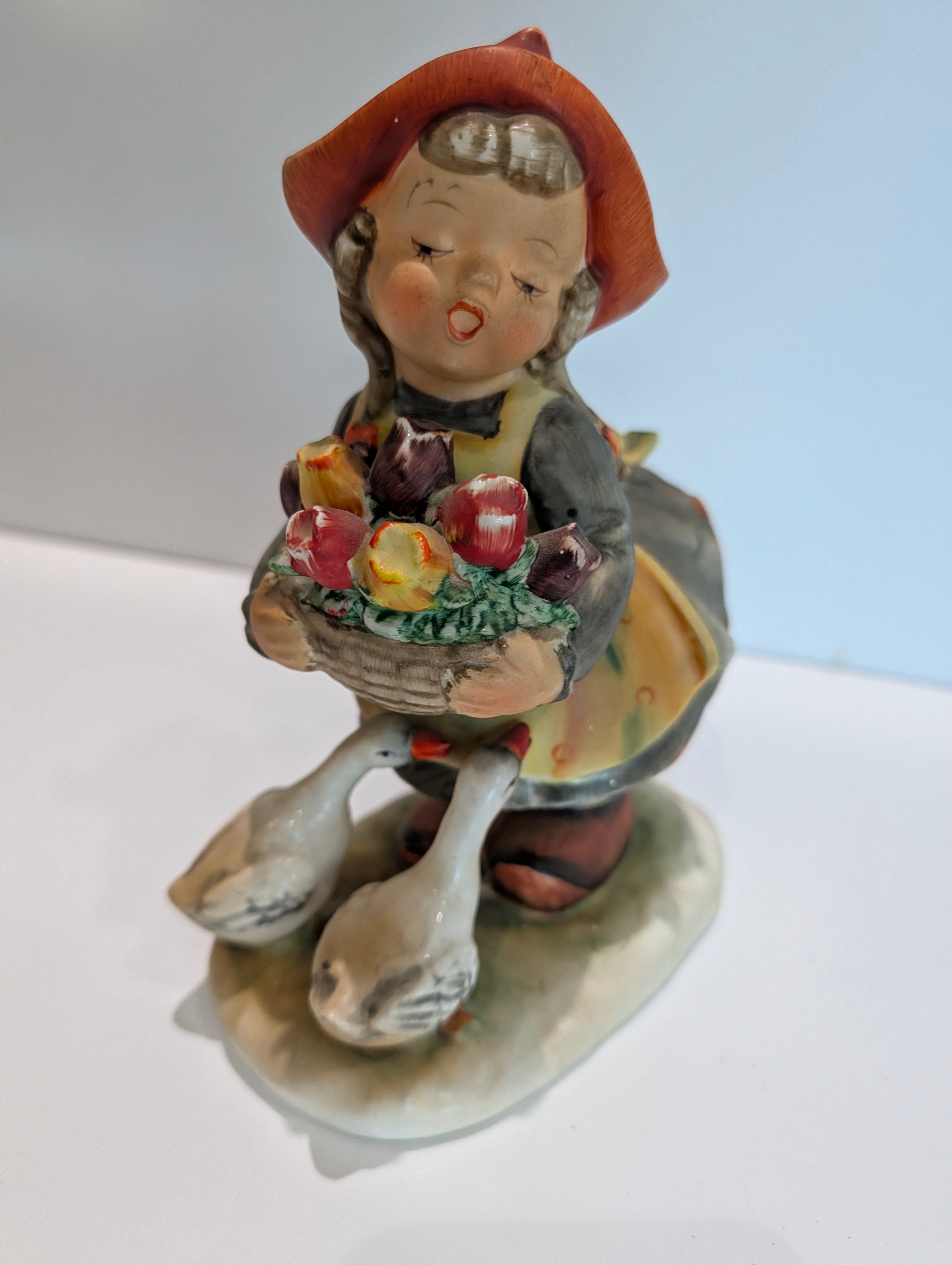 Vintage Hummel-Style Girl with Geese Figurine Holding Flower Basket