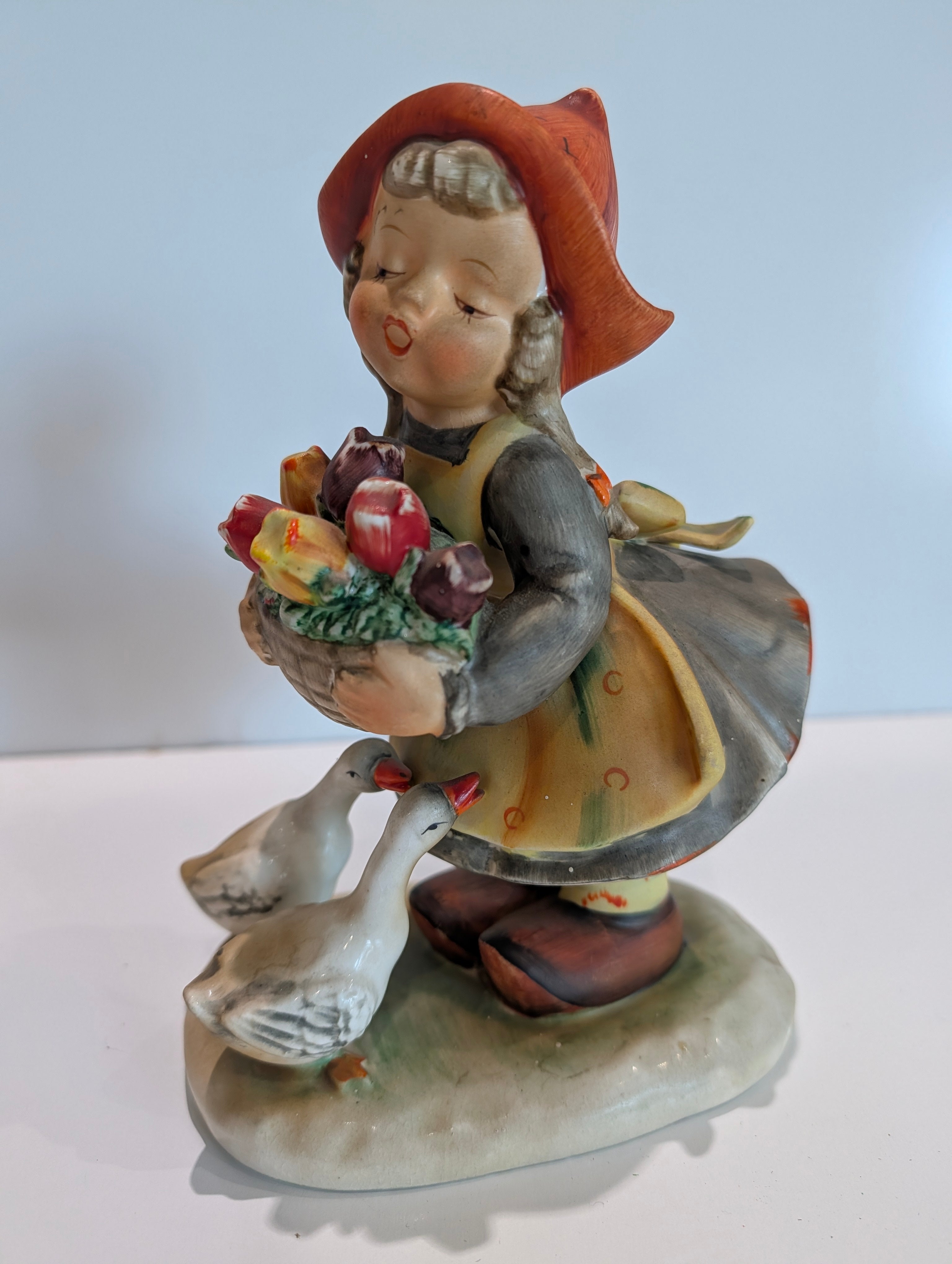 Vintage Hummel-Style Girl with Geese Figurine Holding Flower Basket
