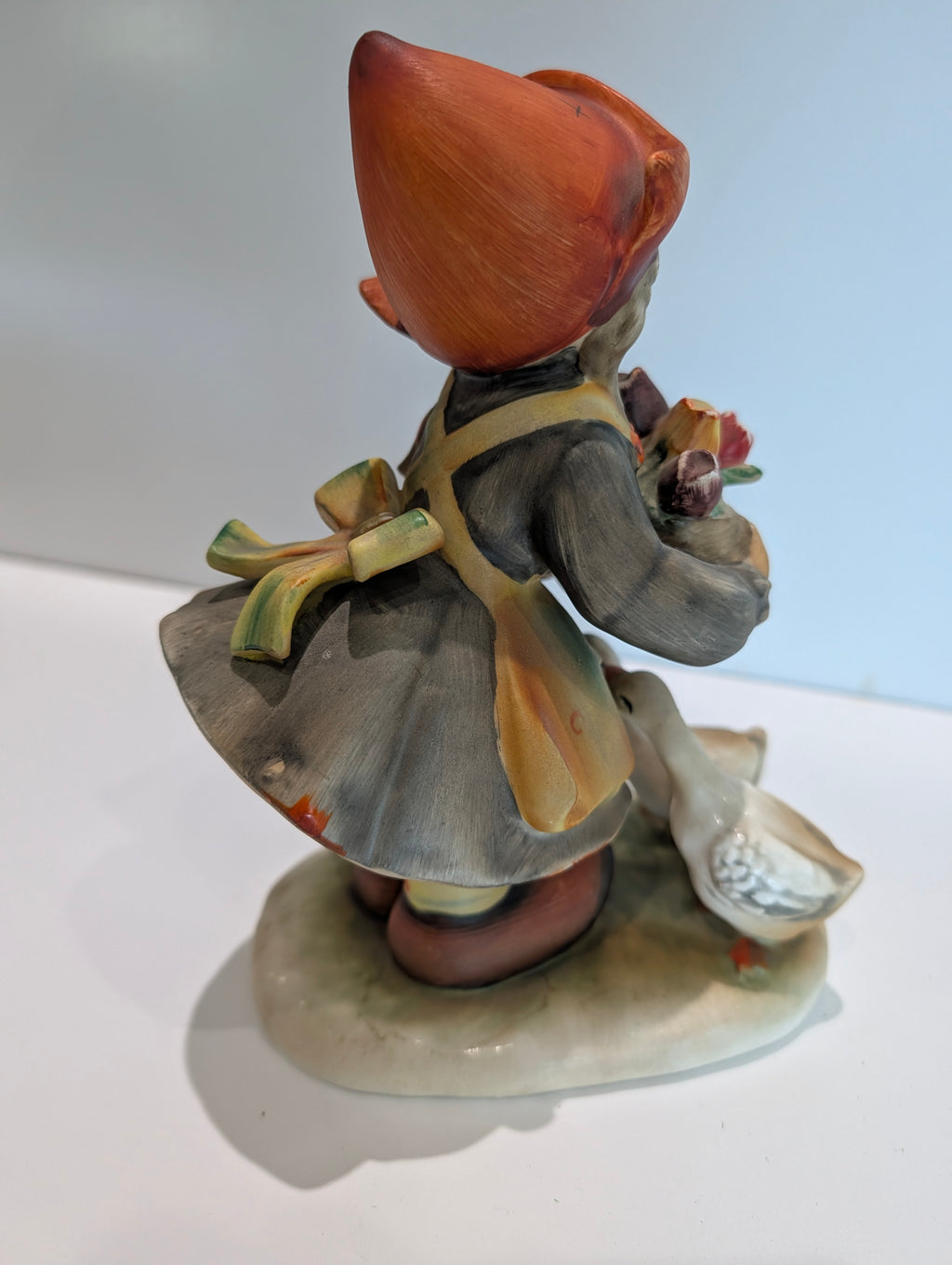 Vintage Hummel-Style Girl with Geese Figurine Holding Flower Basket