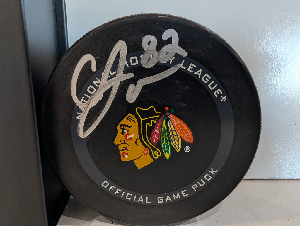 Signed Caleb Jones Chicago Blackhawks Official NHL Game Puck Autograph Fanatics