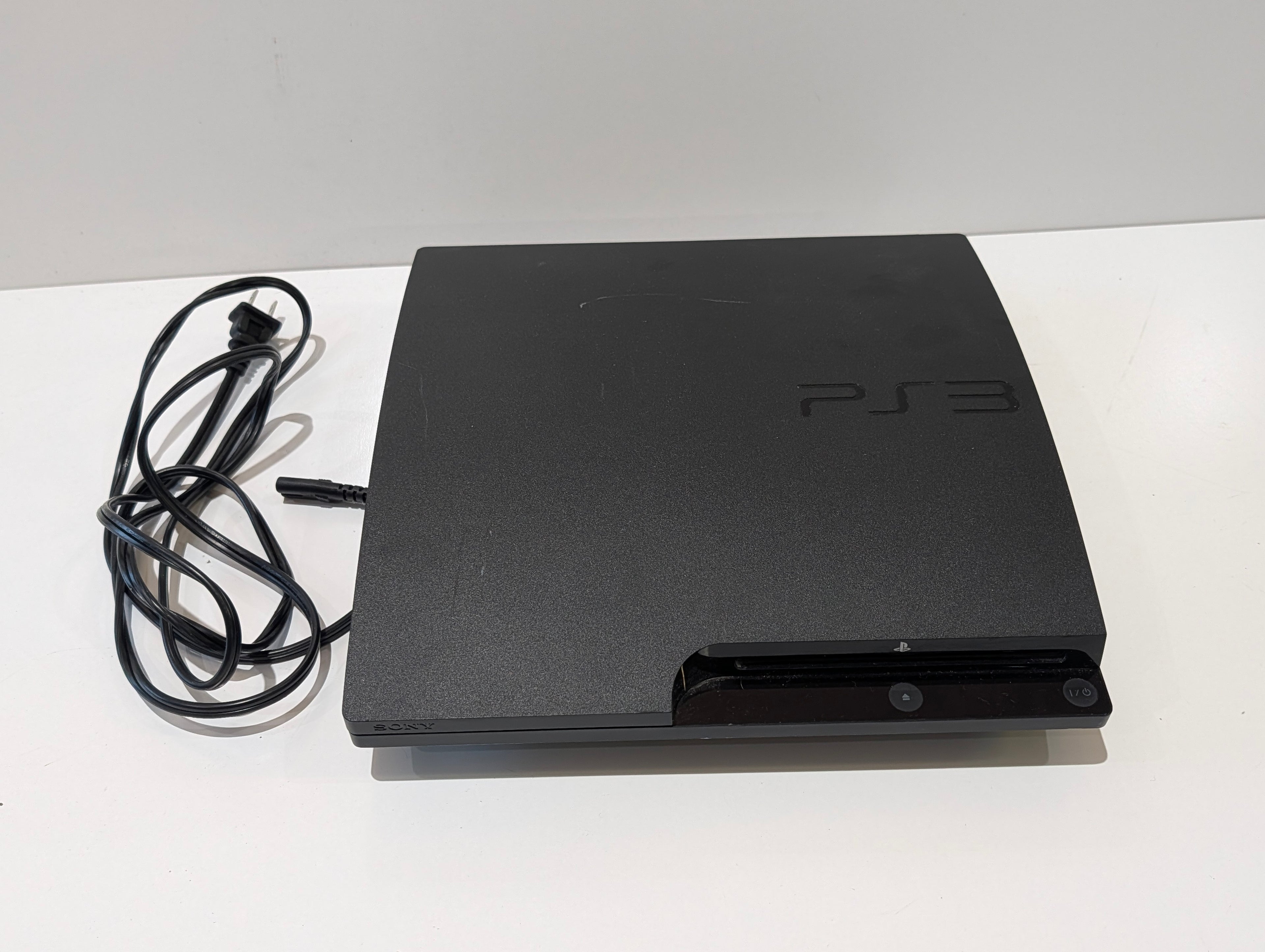 Sony PlayStation 3 PS3 Slim CECH-3001B Console System With Power Cord Bundle