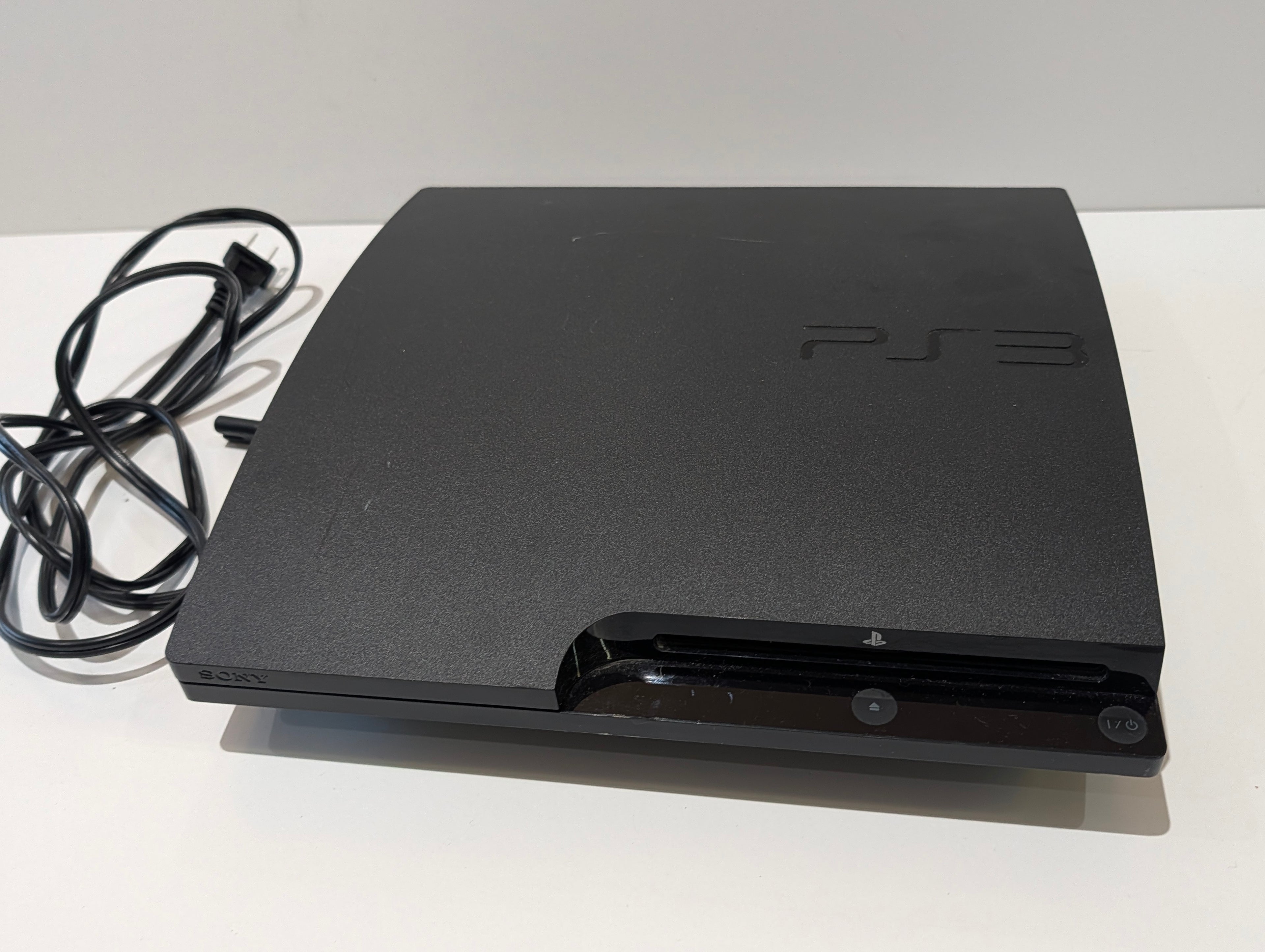 Sony PlayStation 3 PS3 Slim CECH-3001B Console System With Power Cord Bundle