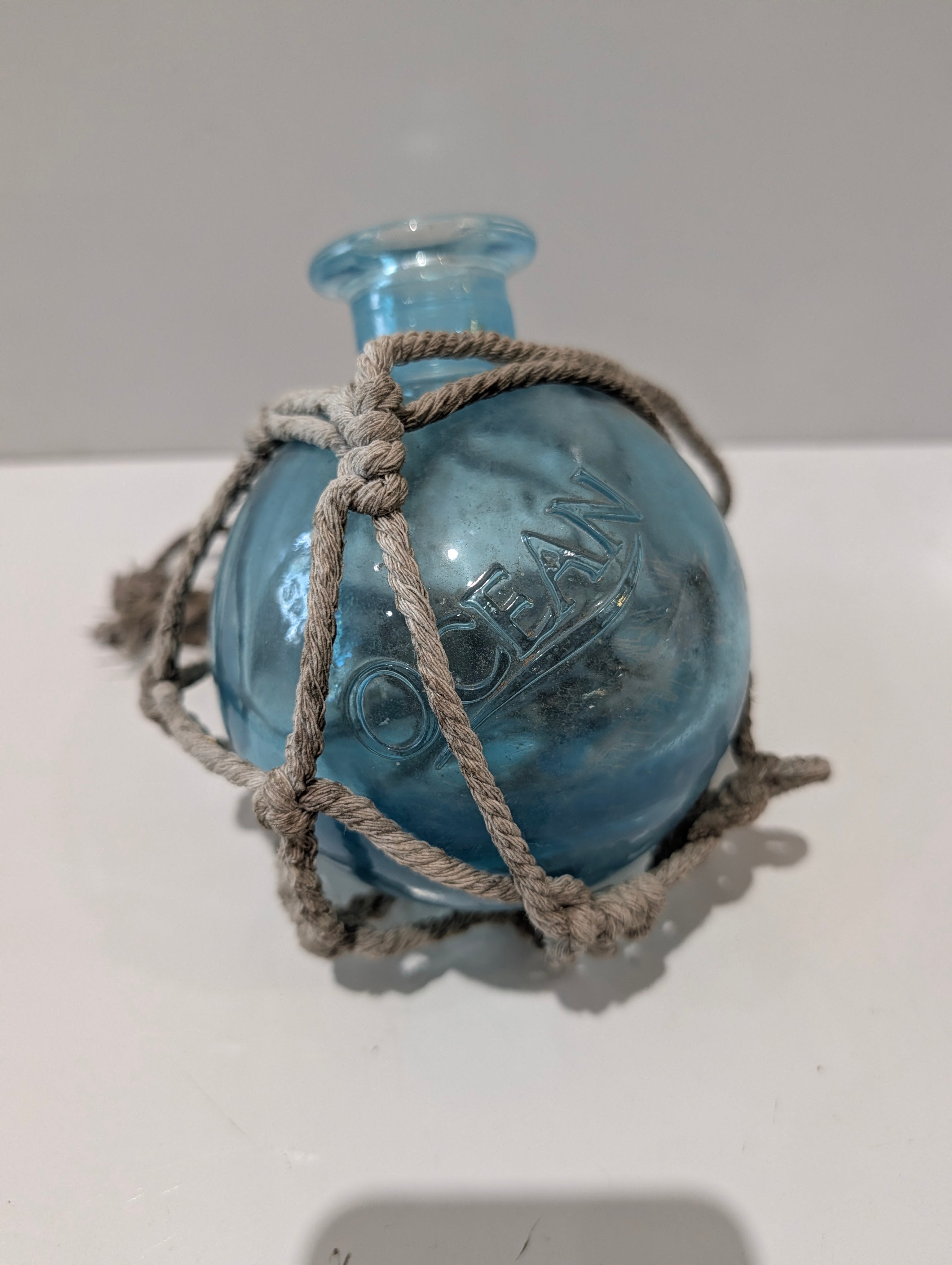 Vintage Ocean Blue Glass Fishing Float With Rope Net Nautical Coastal Decor Collectible